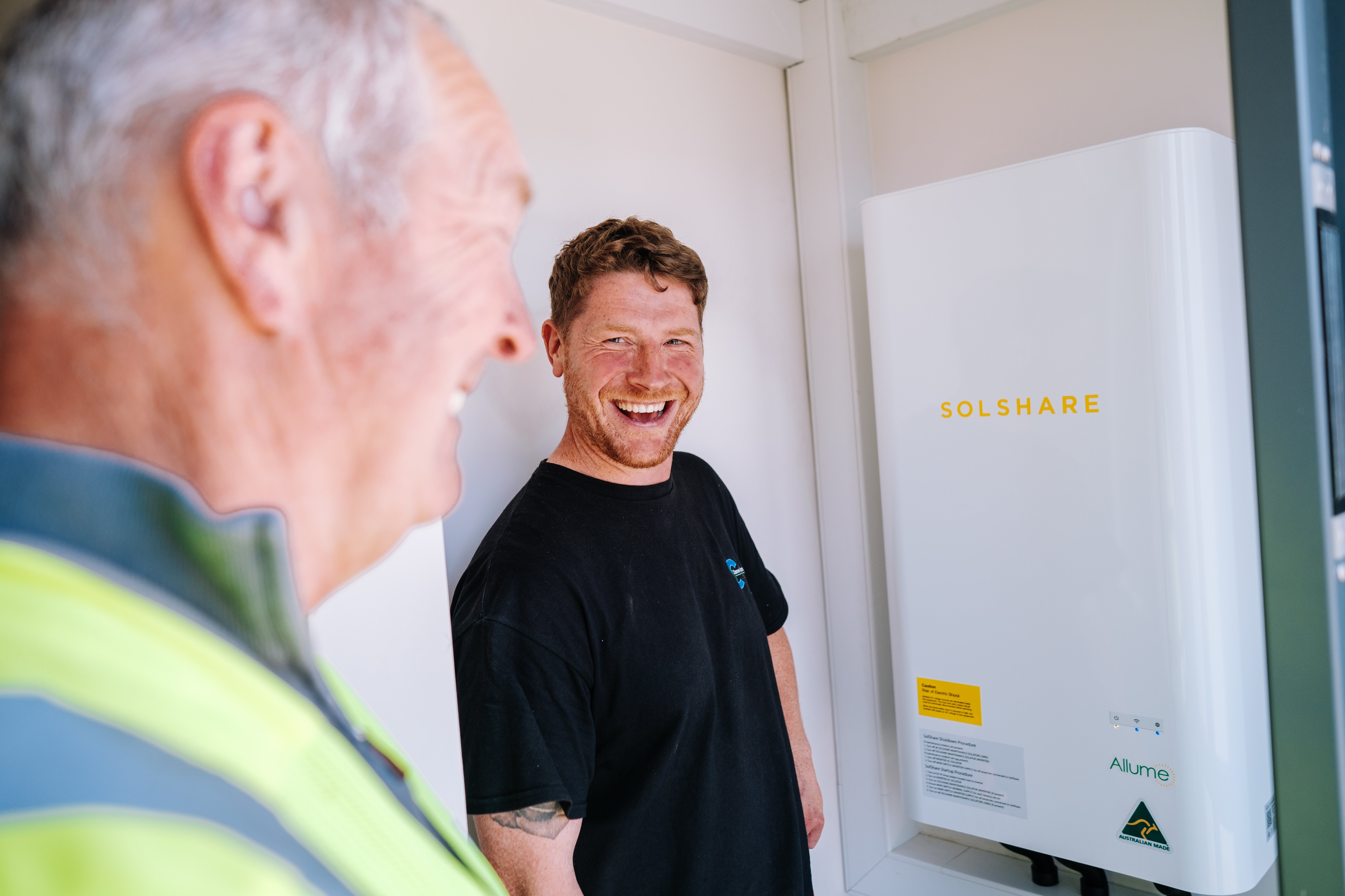 Solar installers at a SolShare site