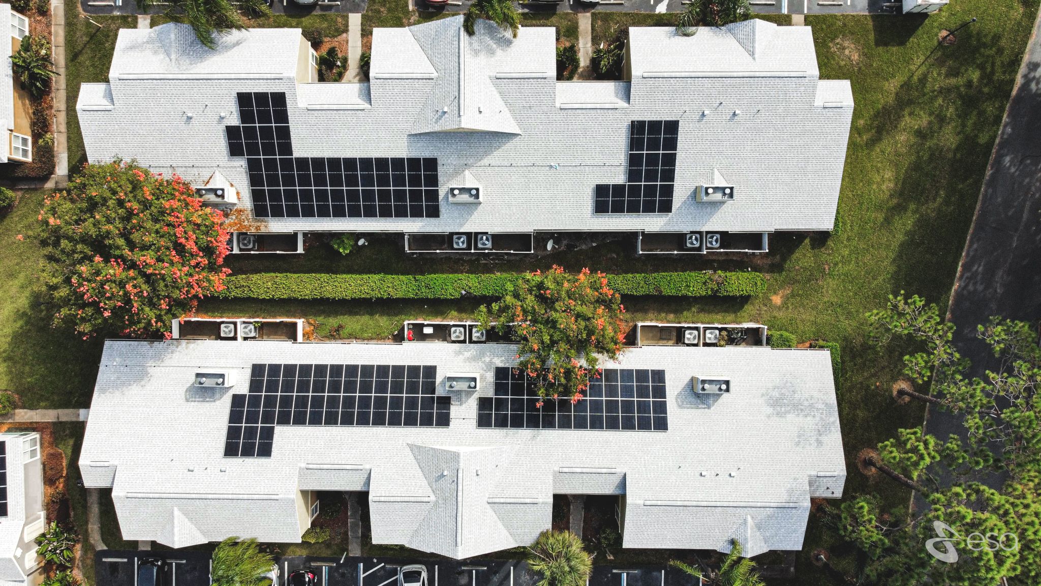 drone photo of shared rooftop solar system at multifamily property in Orlando Florida
